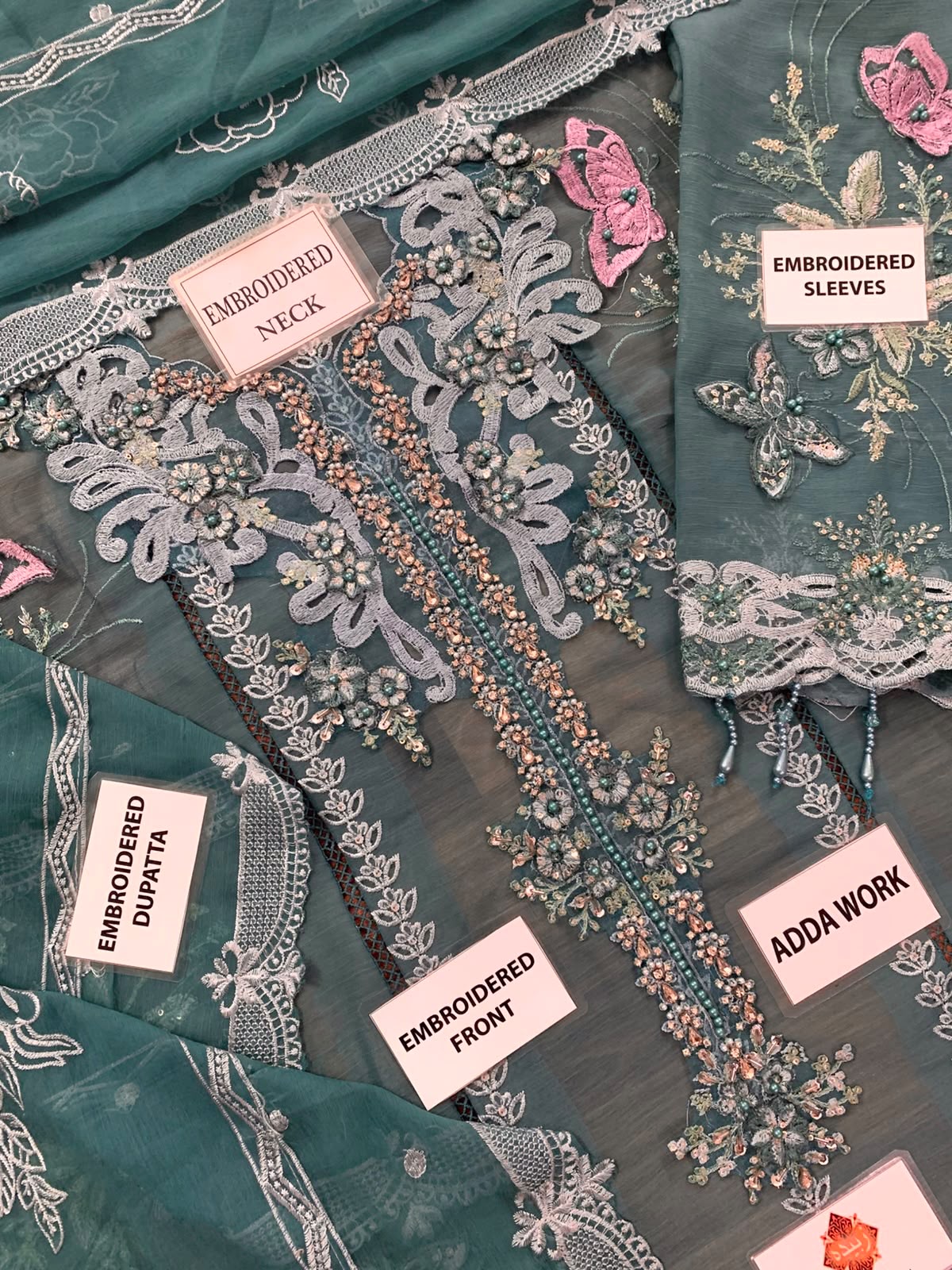 HEAVY EMBROIDERED CHIFFON FRONT EMBELLISHED WITH 3D FLOWERS